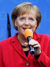 Angela Merkel firar valsegern Tyskland. Foto: Franka Bruns/Scanpix