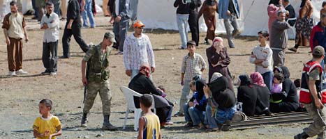 Ett läger för syriska flyktingar i Turkiet. Foto: Vadim Ghirda/Scanpix