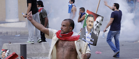 Demonstrationer mot Libanons regering i huvudstaden Beirut. Foto: Hussein Malla/AP/Scanpix