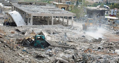 Här träffade de israeliska rakterna, säger Syriens regering. Foto: Sana/Scanpix.