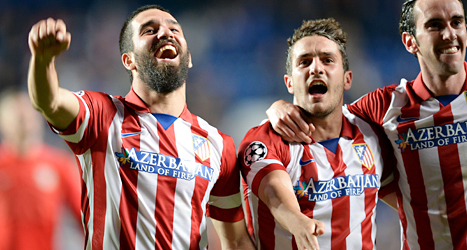Spelarna i Atletico Madrid jublar efter att ha vunnit med 3-1 över Chelsea. Foto: Andrew Matthews/AP/TT