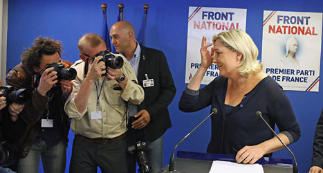 Nationella frontens ledare Marine Le Pen fotograferas efter sin seger i valet. Foto: Remy de la Mauviniere /TT