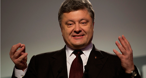 Petro Porosjenkos parti kommer att kunna styra Ukraina tillsammans med två andra partier. Foto: Emilio Morenatti/TT.