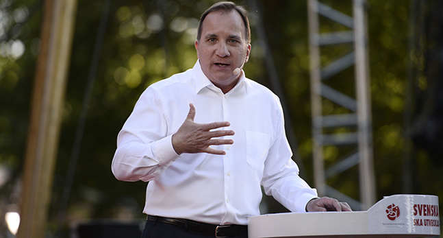 Stefan Löfven i en talarstol.