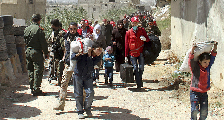 Folk på flykt från området Ghouta