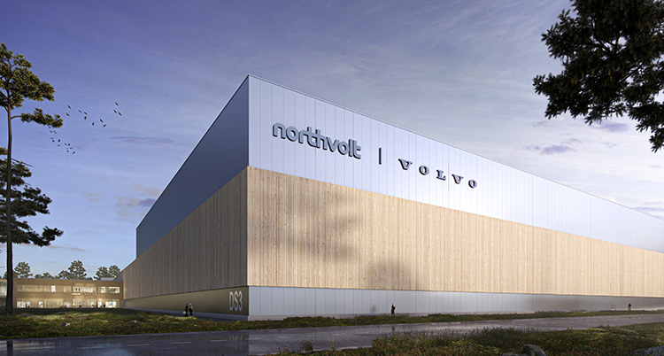 Ett stort hus utan fönster. Det står Northvolt och Volvo på väggen.