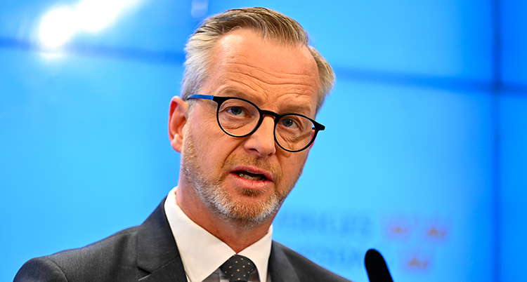 En ansiktsbild på ministern.
