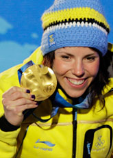Charlotte Kalla vann OS-guld på 10 kilometer skidor. Foto: Jin-man Lee/Scanpix