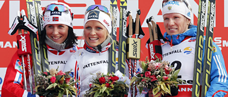 Therese Johaug vann damernas mil-lopp i skid-VM. Sveriges Charlotte Kalla blev utan medalj. Foto: Lise Åserud/Scanpix.