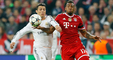 Cristiano Ronaldo i Real Madrid i kamp med David Alaba i Bayern München. Foto: Matthias Schrader /TT