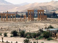 Skadade byggnader i Palmyra.