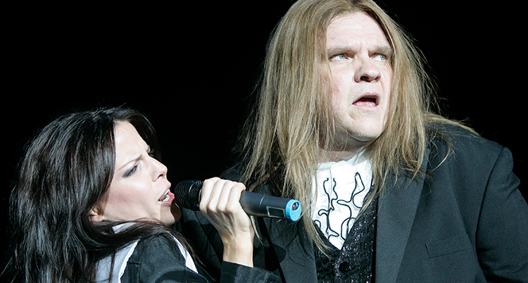 Meatloaf sjunger med en kvinna. Foto: TT