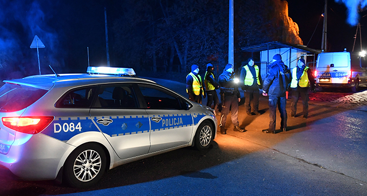 Polish police officers patrol in Przewodow village