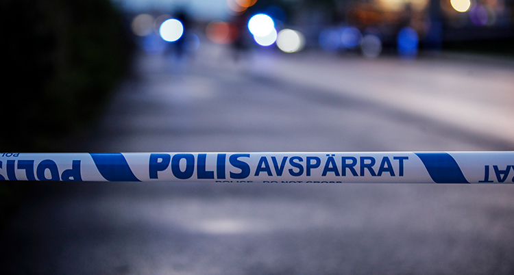 En polisavspärrning på en gata.