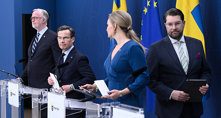 Ledarna för tre partierna i regeringen och Sverigedemokraternas ledare.