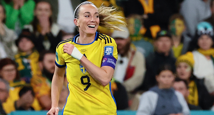 Glad fotbollsspelare.